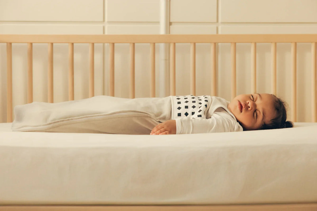 Nanit Pro Camera on Floor Stand beside the cot