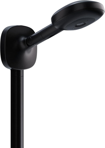 Nanit baby monitor with sleek design and camera lens, shown in a nursery setting for secure infant monitoring.